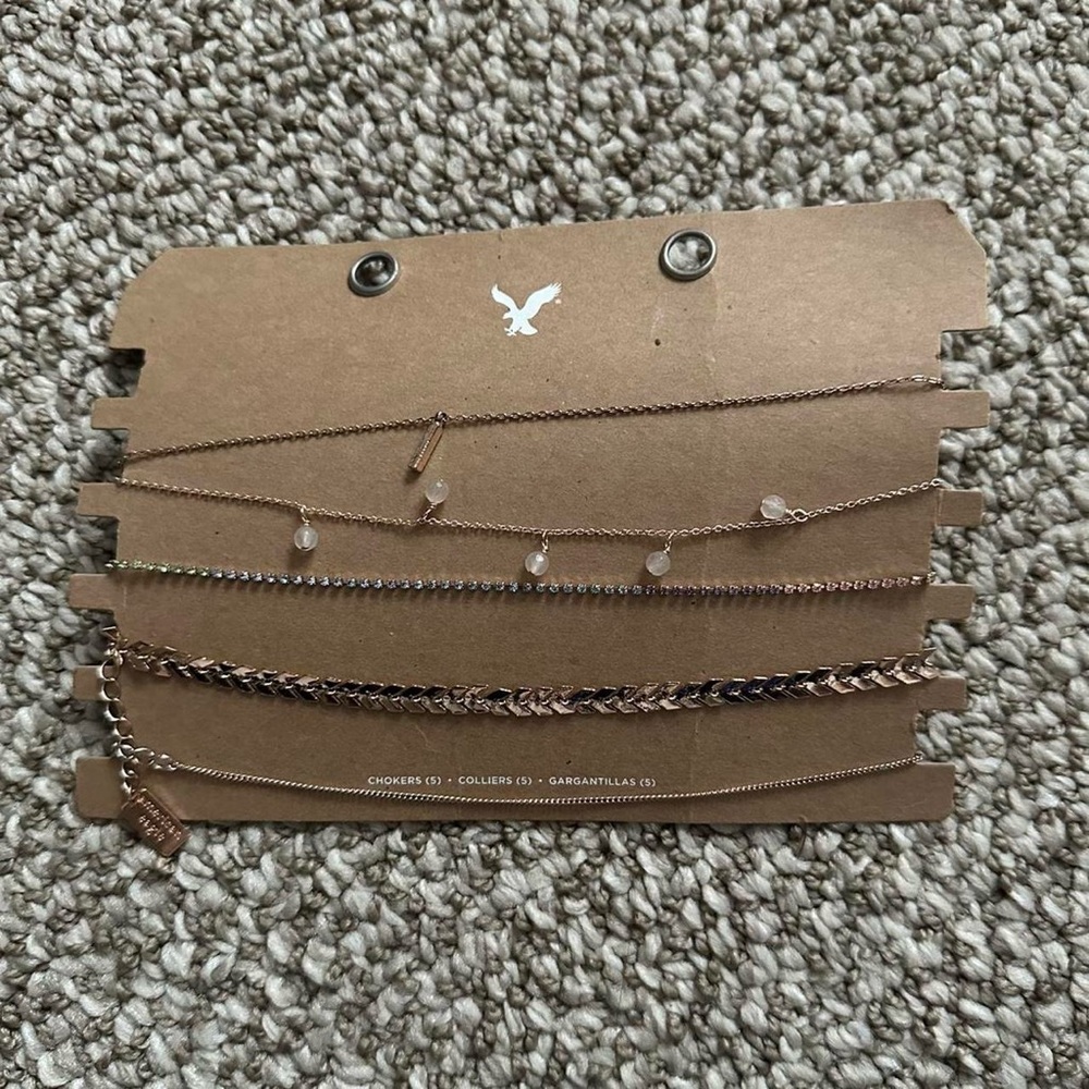 Set of five American Eagle gold choker necklaces